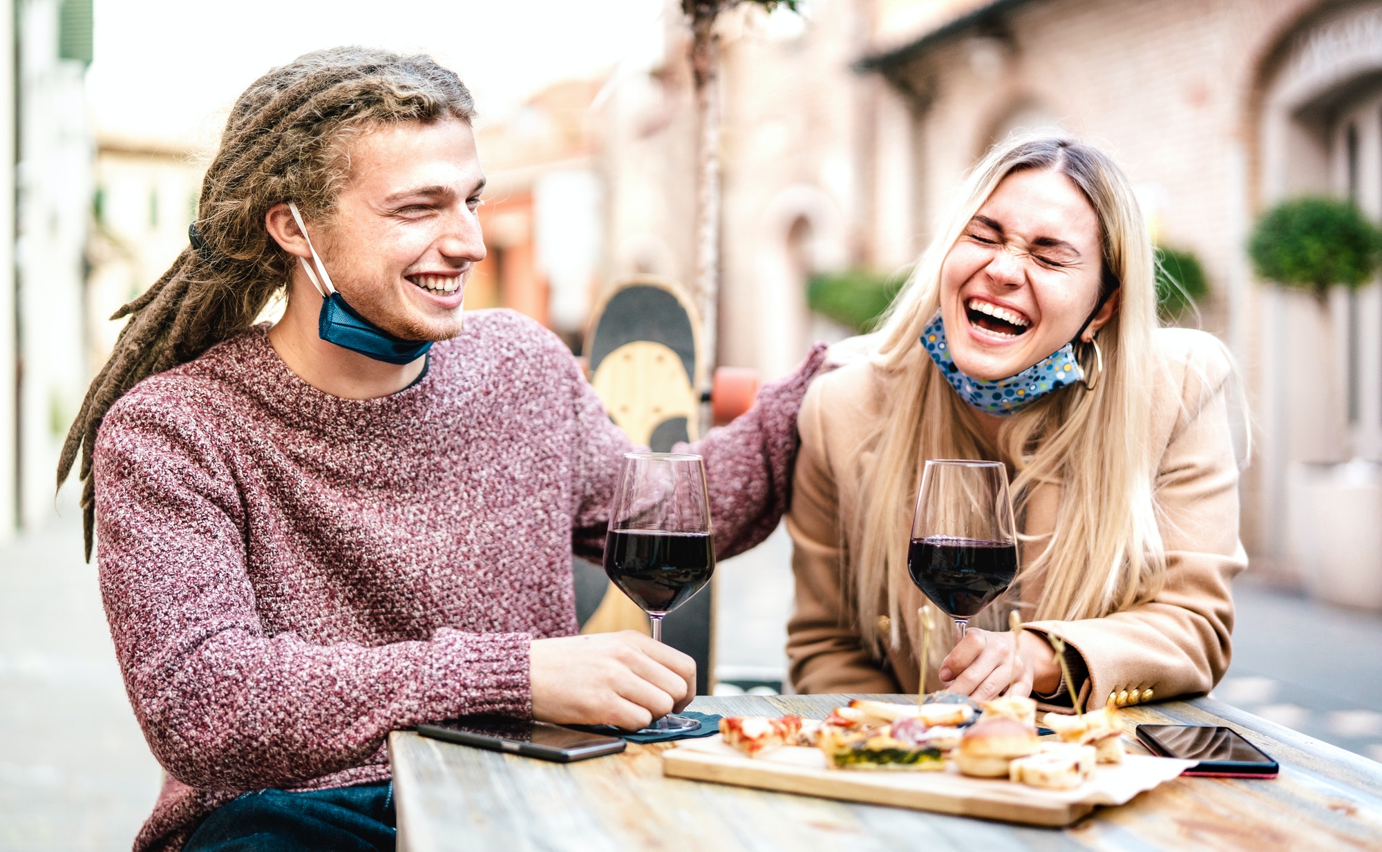 Couple having fun at winery bar